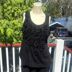Sleeveless scoop neck top with ruffle detailing